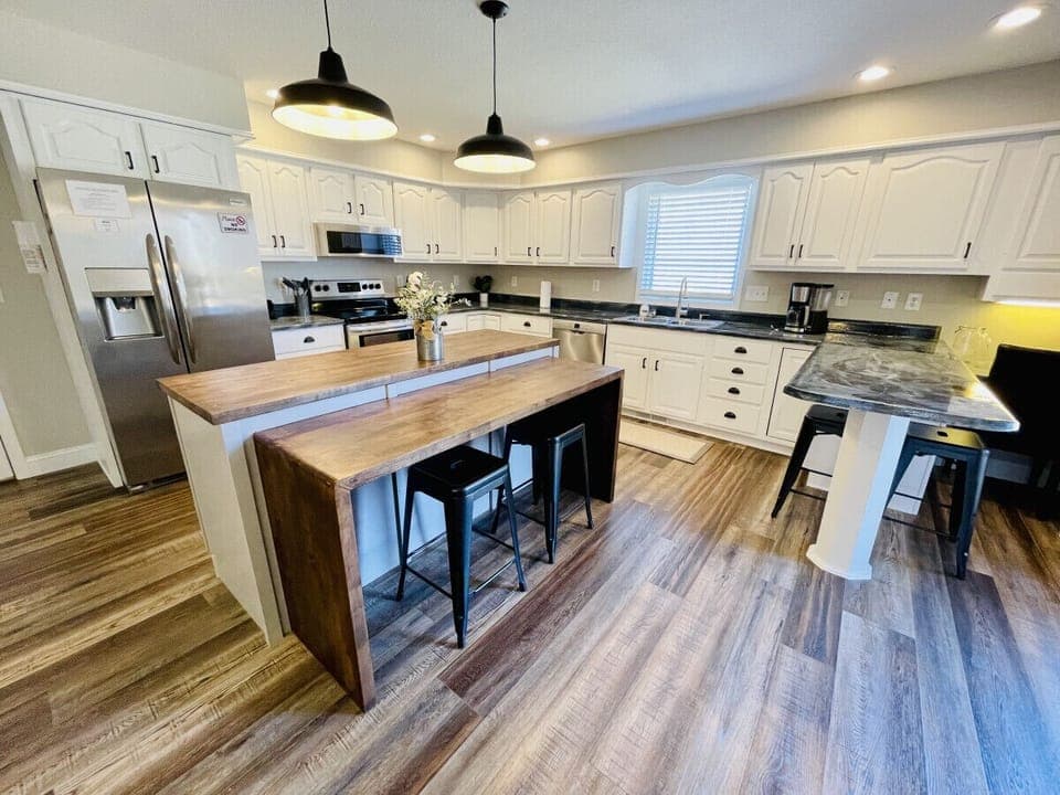 Spacious kitchen with eat in bar