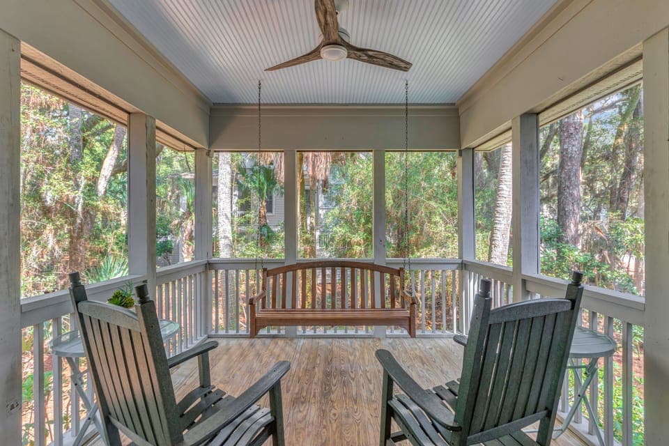 Take in the greenery with the screened porch!