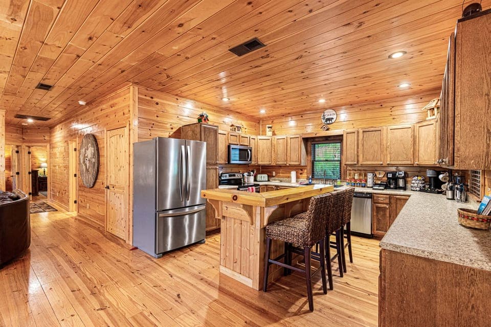 Kitchen Delight: Cook up a feast in this stunning wood-accented kitchen with modern amenities!