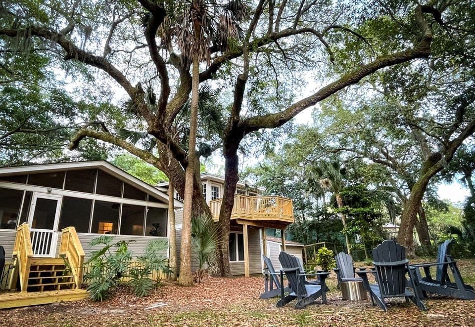 Beautiful backyard with plenty of trees and shade.  Perfect for any season
