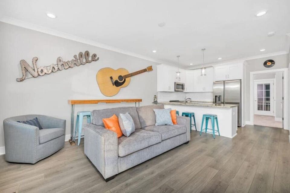 Gathering area open to the kitchen. Sofa pulls out for more sleeping options
