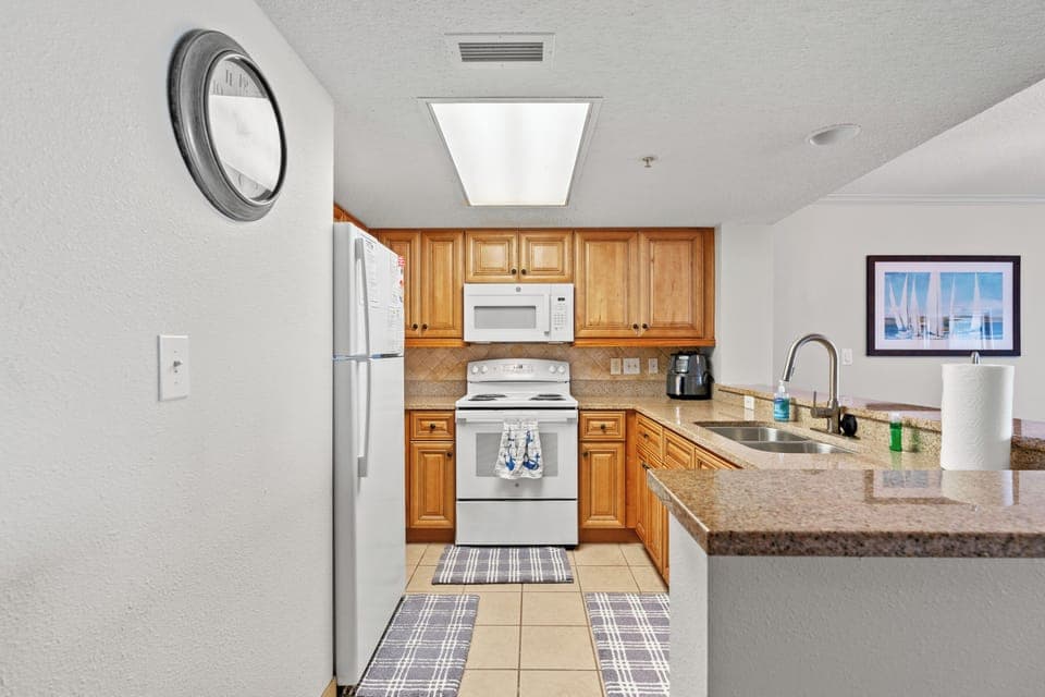 Condo, 3 Bedrooms, Balcony, Ocean View (520) | Private kitchen | Microwave, coffee/tea maker, toaster, cleaning supplies