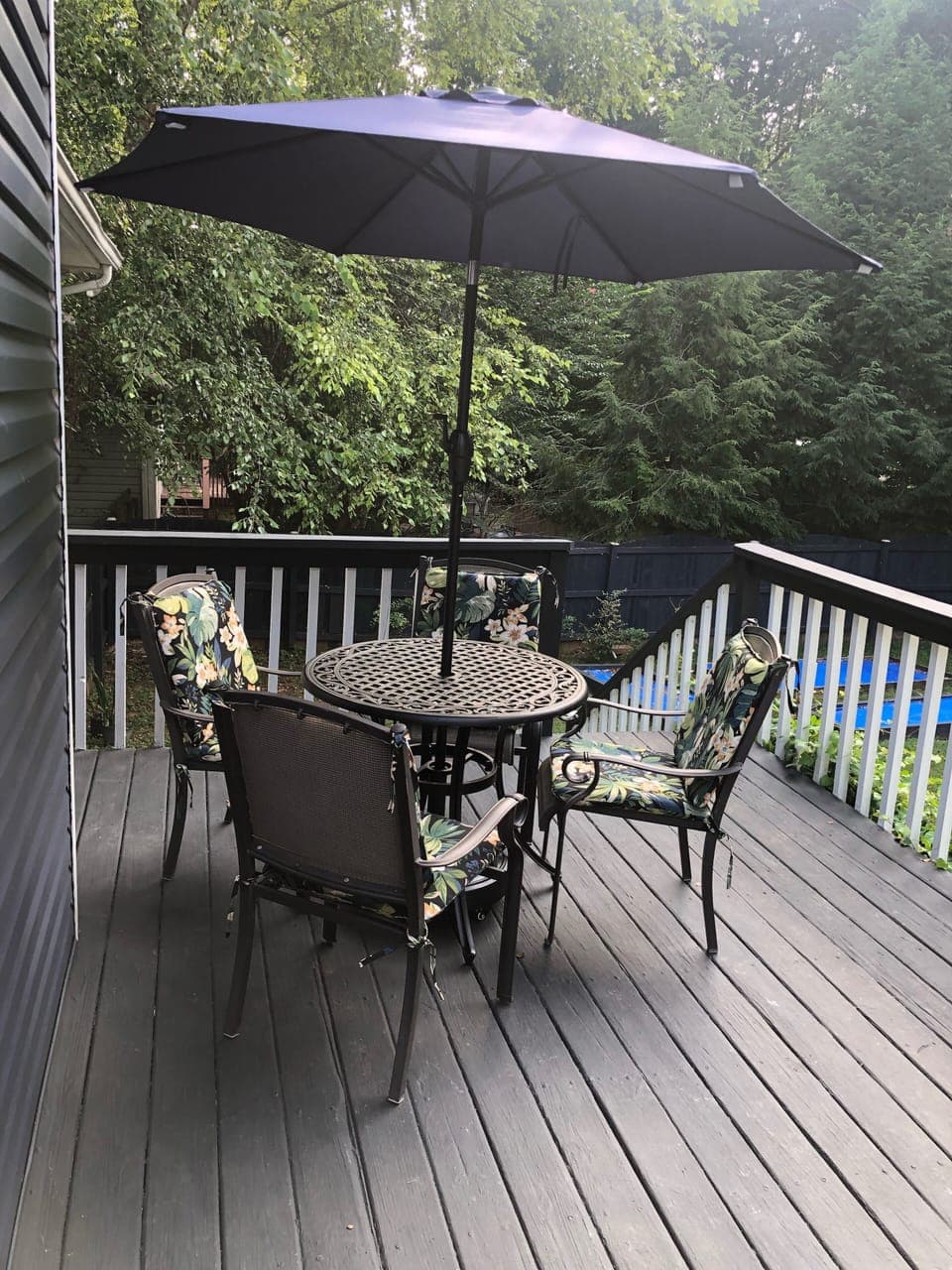Back deck with shaded table/chairs 
