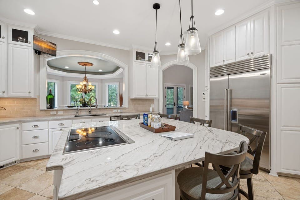 Fully stocked, modern kitchen with island seating!