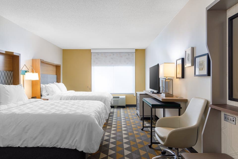 Premium bedding, down comforters, desk, laptop workspace