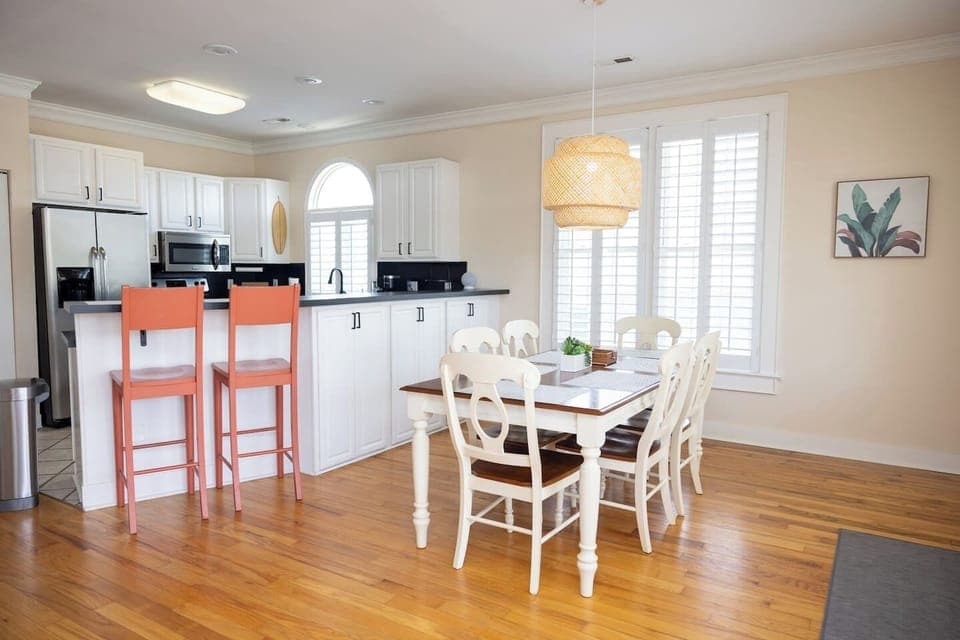 Spacious kitchen with extra seating at the bar. Additional cabinet space on the back of the bar. Full pantry not seen in photo.