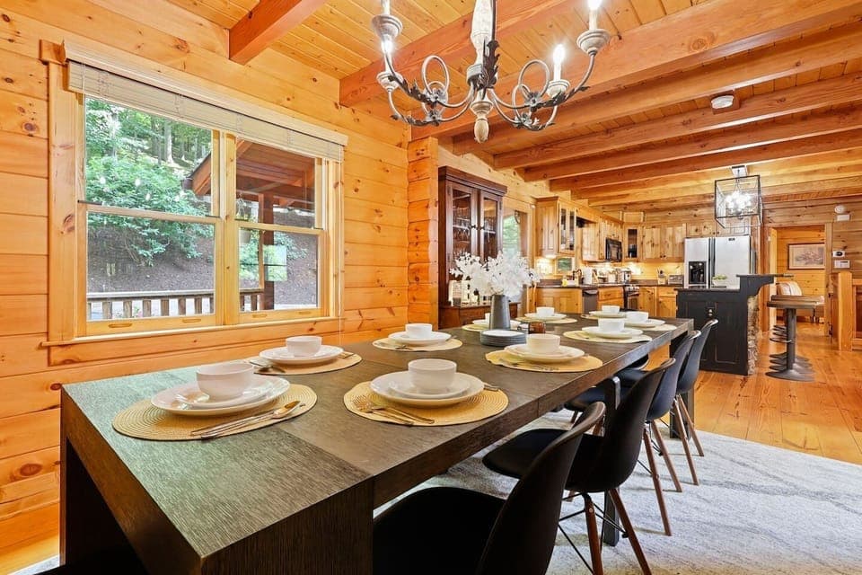 We have a custom-made extendable table for you and your family/ friends that can comfortably sit 10-14 people.