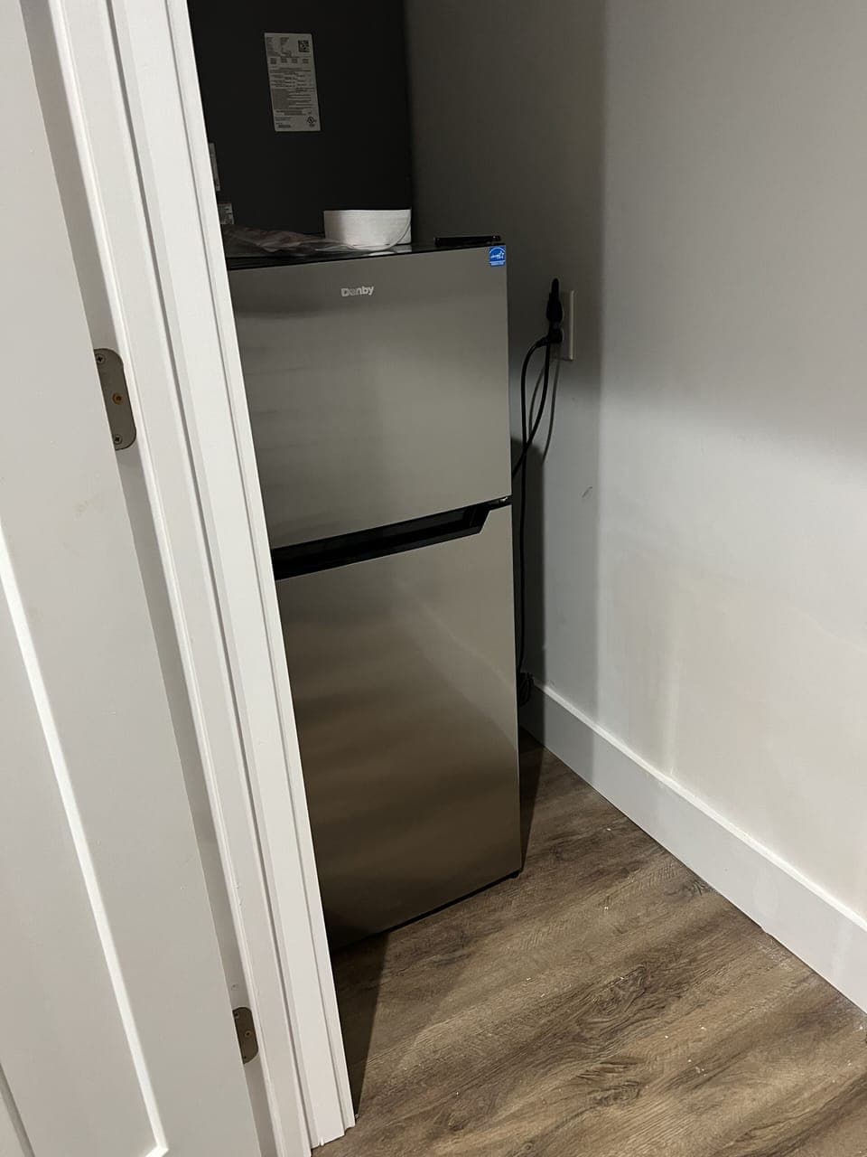 Small fridge in entertainment area