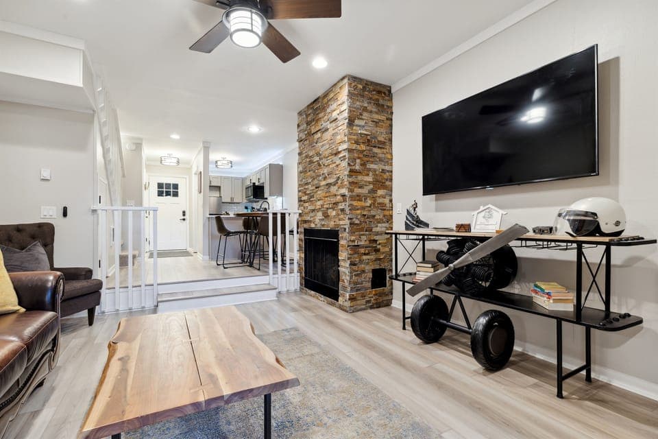 Enjoy the cozy living room with a gas fireplace and a Roku TV