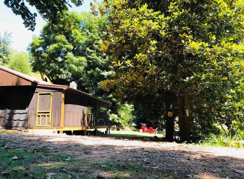 Welcome to Cabin at the cove! Enjoy the green oasis within the marina community.