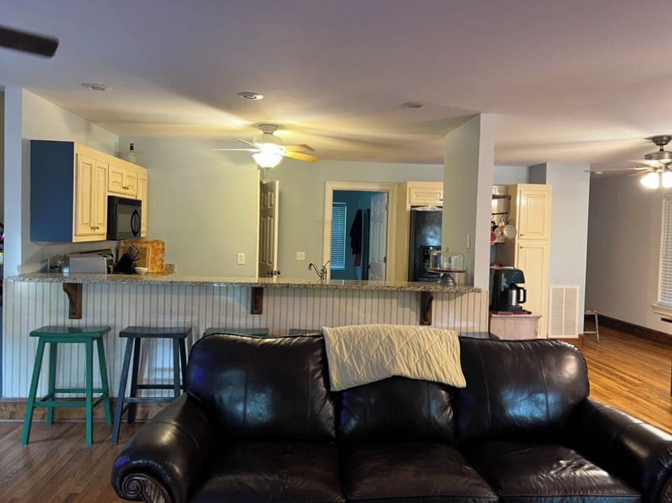 Main level open concept living area.  Kitchen bar can accomodate 6 guests.