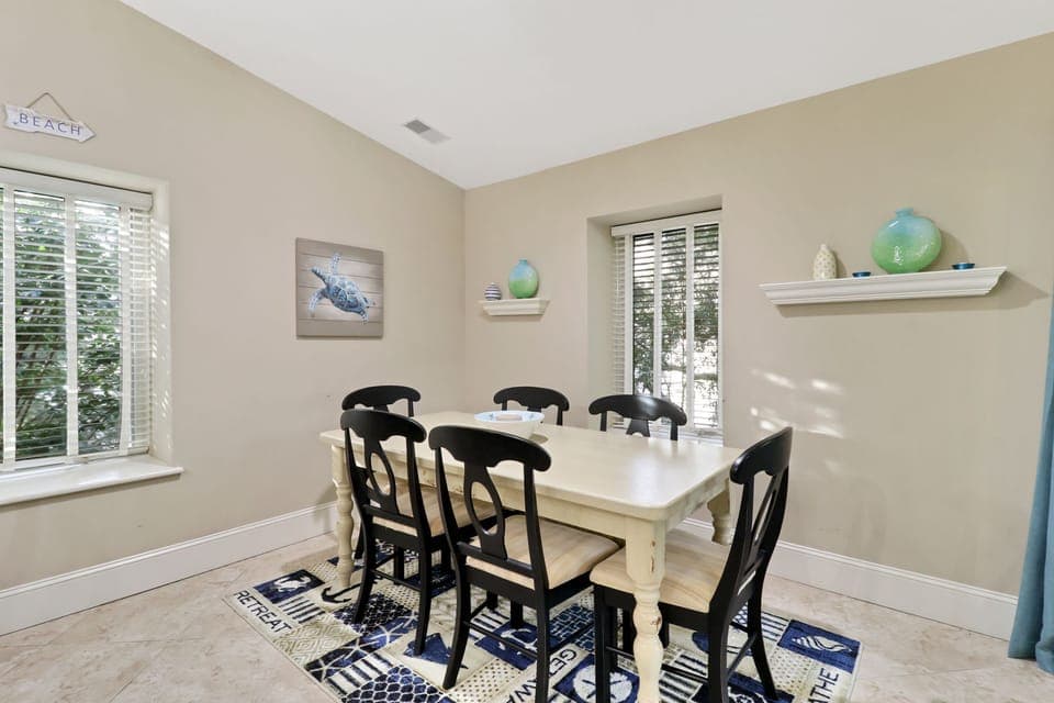 1692 Bluff Villas - Dining Area - Updated dining room furniture comfortably seats six.