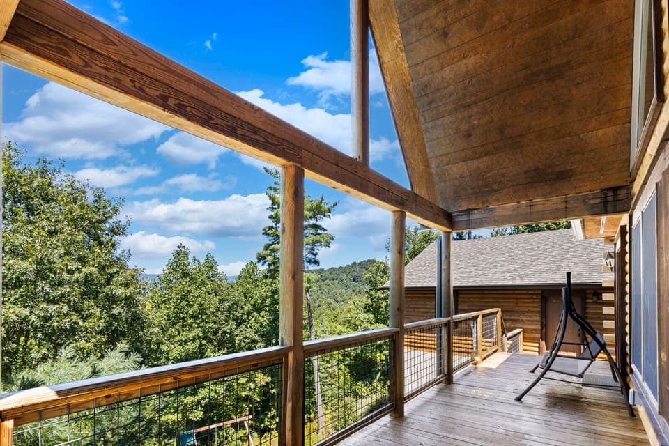 Porch Swing Overlooking Peaceful Wooded Mountains