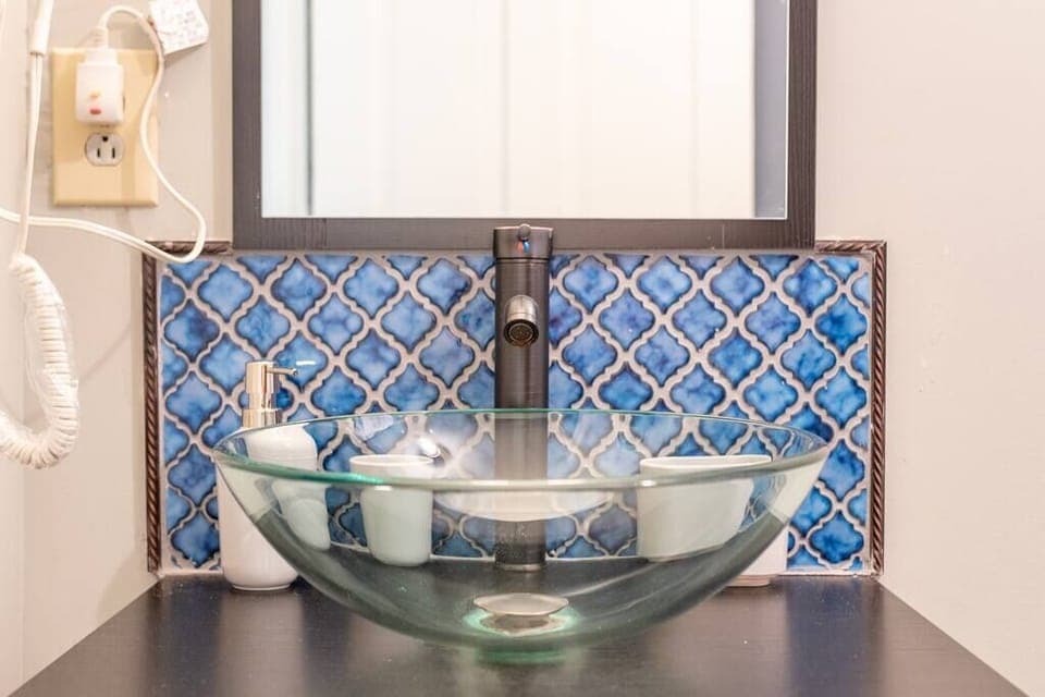 Beautiful bathroom with free hair dryer to use. 