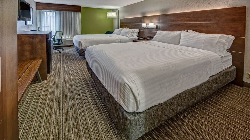Down comforters, pillowtop beds, in-room safe, desk