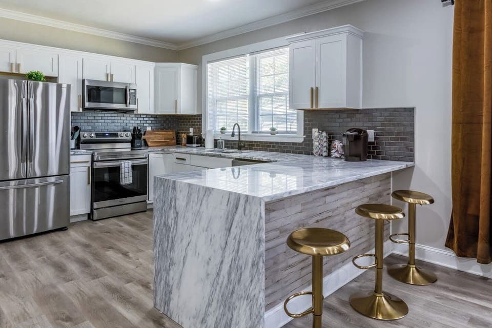 Fully equipped kitchen with stainless steel appliances and every cooking or baking utensil you  may need.