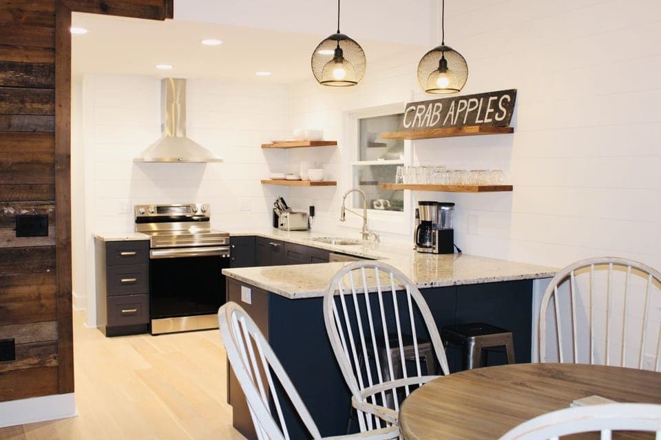 Newly renovated kitchen with all new appliances and breakfast bar.