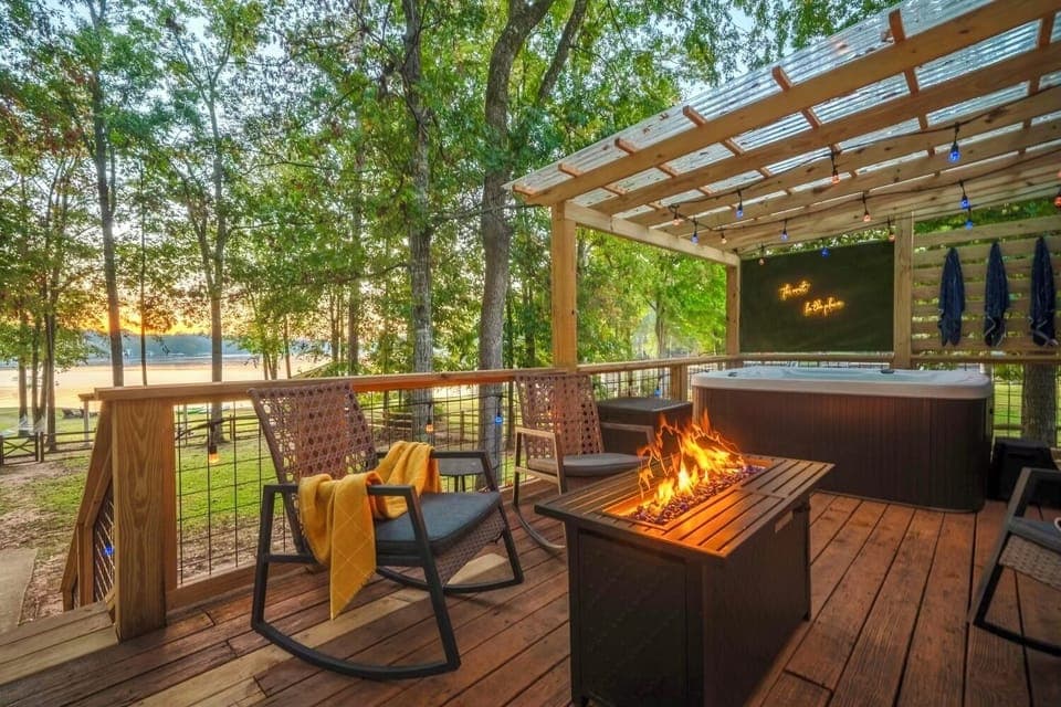 Serene lakefront views from the backdeck firepit and private covered sauna areas