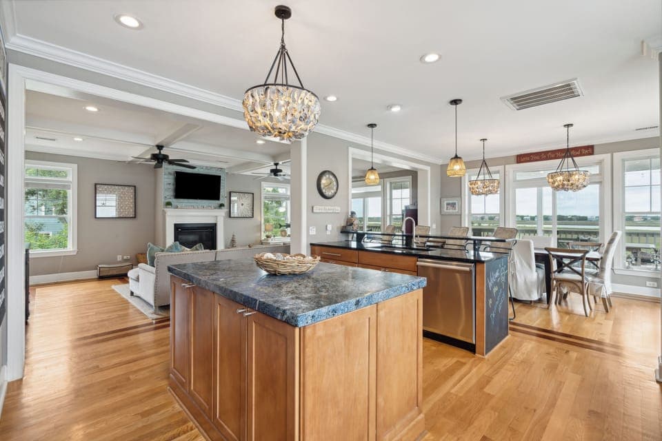Open concept kitchen, living room and dining space perfect for entertaining friends and family.