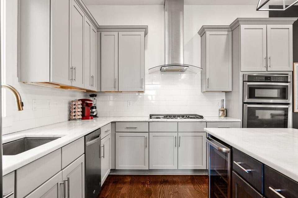 Fully loaded with stainless steel appliances, double ovens, a gas range, and all the counter space your group needs to cook up something great.