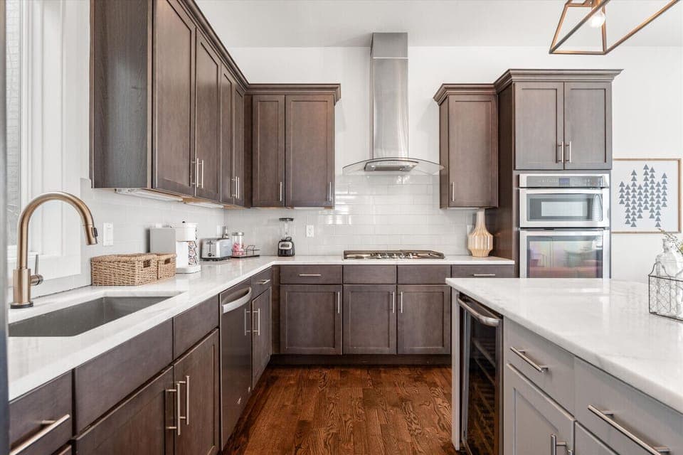 Fully loaded with stainless steel appliances, double ovens, a gas range, and all the counter space your group needs to cook up something great.