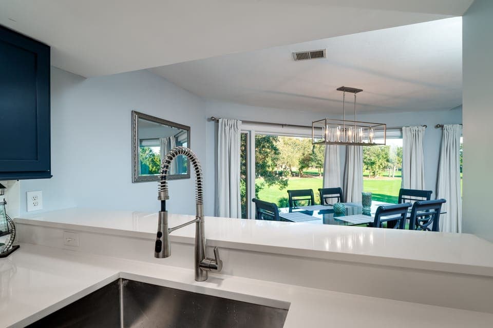 The kitchen is open to the dining and living areas
