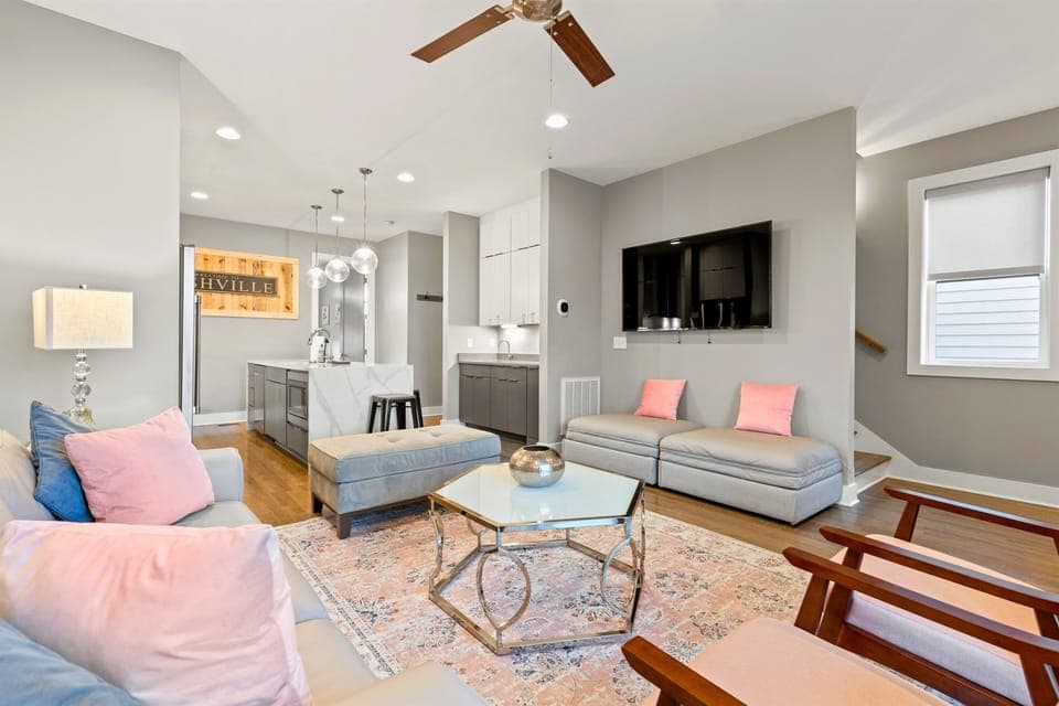 Enjoy your favorite movies, sports, and shows on Casa Rosalie’s living-room TV. This cozy living room provides extra sleeping space with two twin pull-out beds