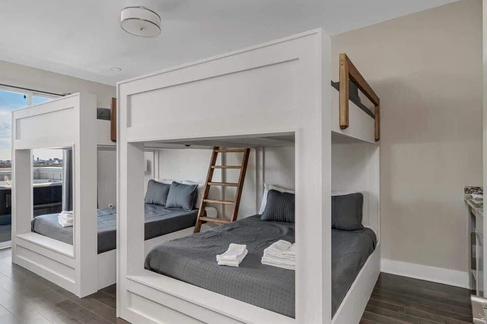 Bedroom 4 - 2 Queen over Queen bunk beds. Top floor w/access to the balcony!
