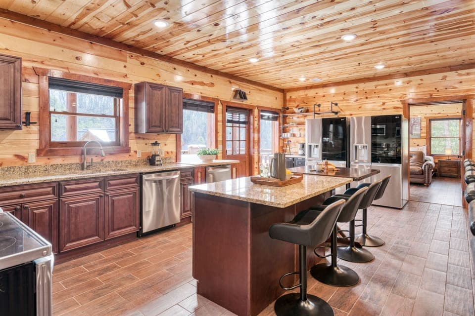 Spacious kitchen boasts dual appliances to easily feed a large group.
