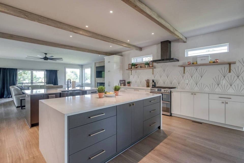 This fully equipped kitchen includes stainless steel appliances, an oven, stove, microwave, dishwasher, fridge, freezer, and a coffee maker with a starter supply of pods. You’ll also find cooking and baking basics, a toaster, blender, BBQ utensils, wine glasses, outdoor plates, a full dining set, and even Alexa for music—all complemented by high-speed WiFi to keep you connected.