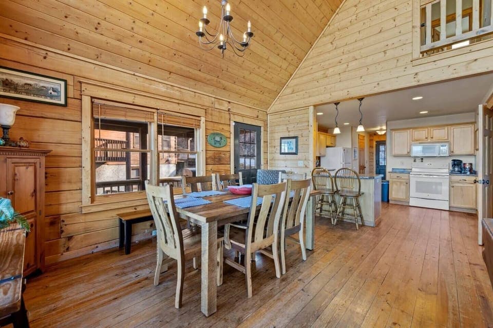 The dining room stretches to the kitchen and island that seats two. 