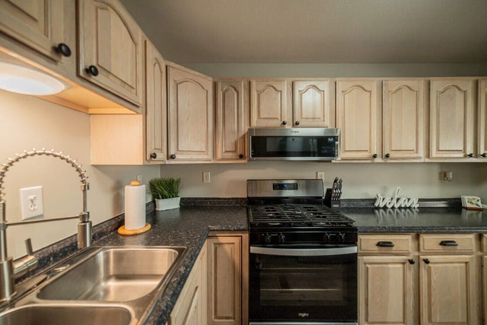 Gas range with microwave above.
