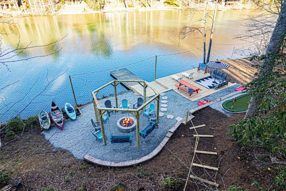 Experience the ultimate in outdoor relaxation with spacious lakefront firepit which feels very private. Take in the mesmerizing views while warming up by the cozy fire. 