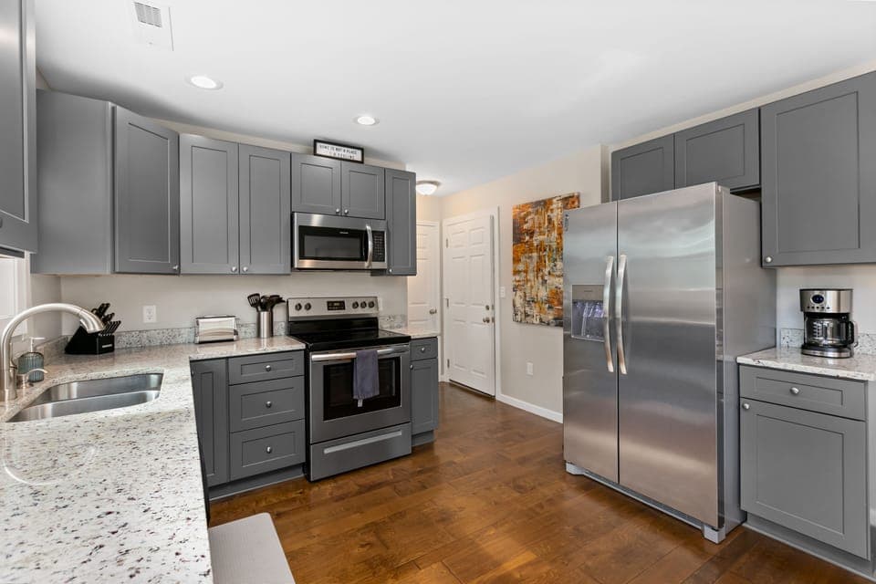 Full suite of appliances in the kitchen.