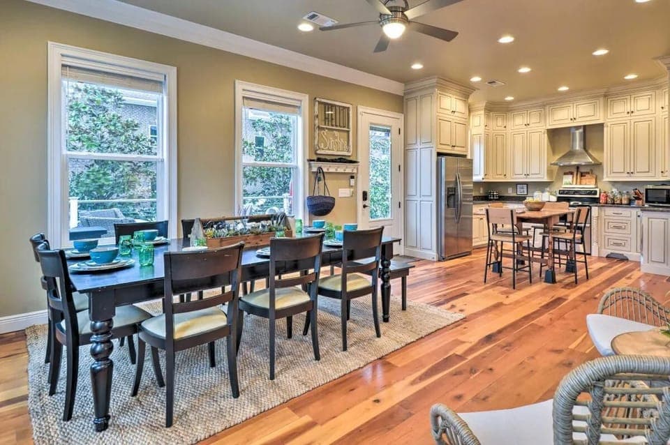 Main Floor Kitchen: Everyone can eat together!  Two tables seat a combined 14 people.