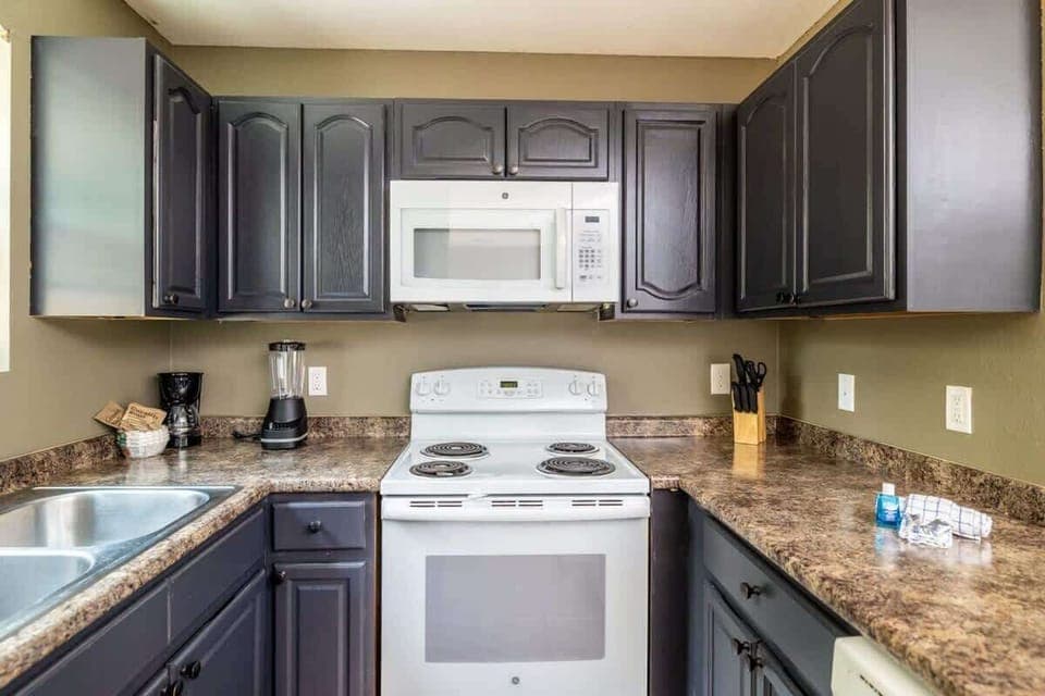 Our kitchen is a perfect blend of style and functionality. It boasts luxurious granite countertops and modern stainless steel appliances. Cooking has never been this glamorous!