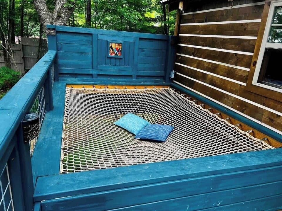 Oversized hammock built into the deck, perfect for daydreaming and taking into the sights around you