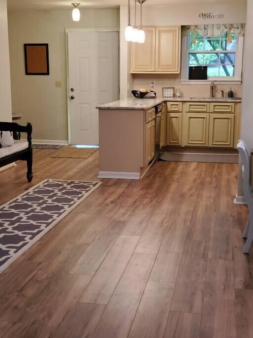 Kitchen has no doors and is open to living area. 