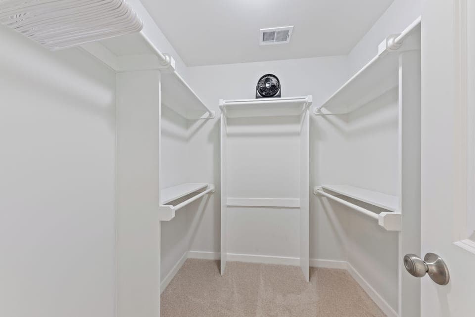 Master bedroom walk in closet for storage if you're staying for an extended time