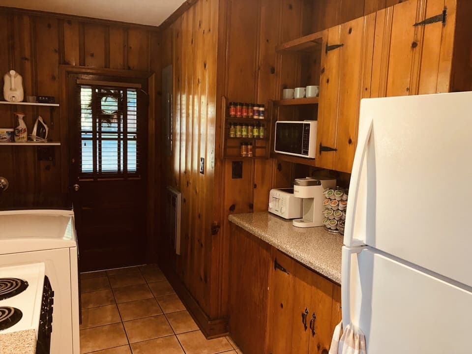 A view of the kitchen from the dining/living room area. 