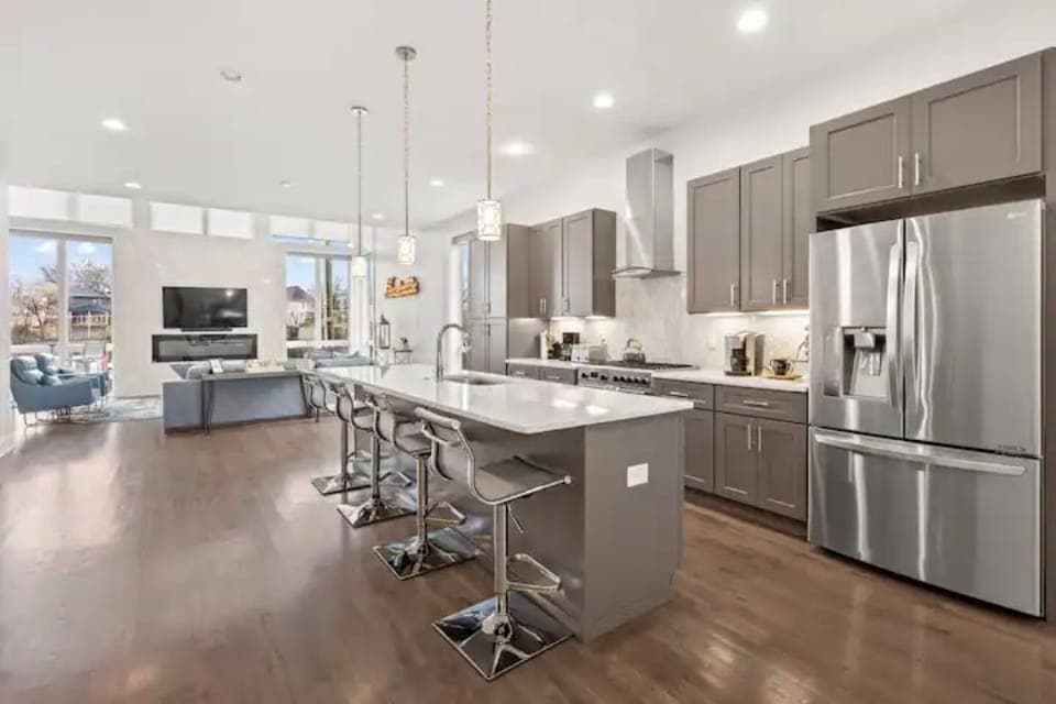 View of kitchen through to living area. Very open feel. Room for everyone. 