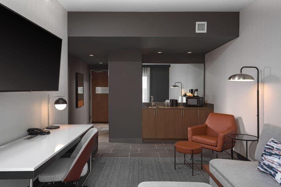 55-inch flat-screen TV with cable channels, Netflix, streaming services