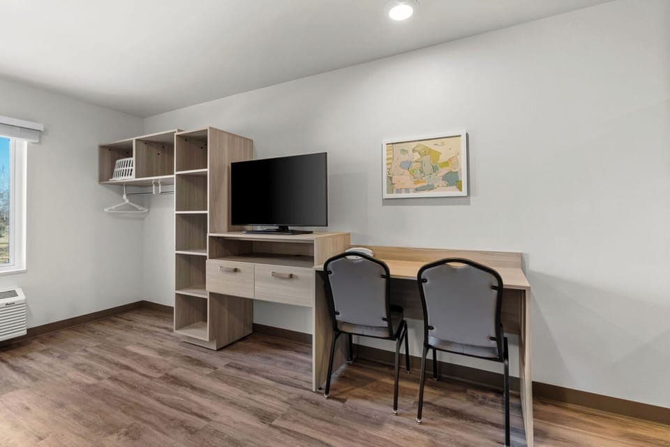 Suite, 1 King Bed, Non Smoking | Desk, laptop workspace, blackout drapes, free WiFi