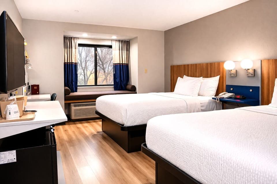 Standard Room, 2 Queen Beds | Premium bedding, desk, free cribs/infant beds, rollaway beds