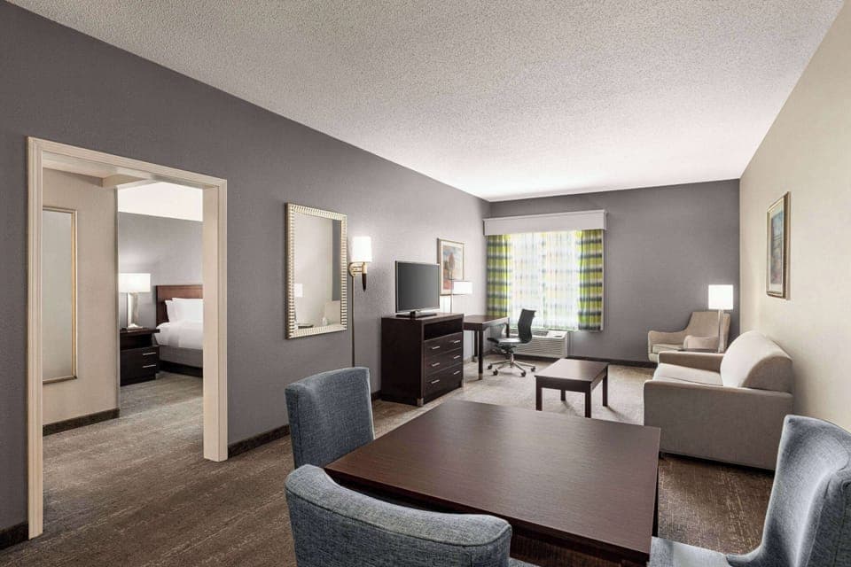Studio Suite, 1 King Bed, Non Smoking | Desk, laptop workspace, blackout drapes, iron/ironing board