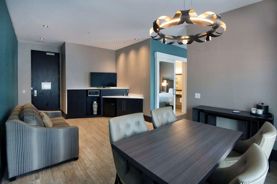 Suite, 1 King Bed, Non Smoking | In-room safe, desk, laptop workspace, blackout drapes