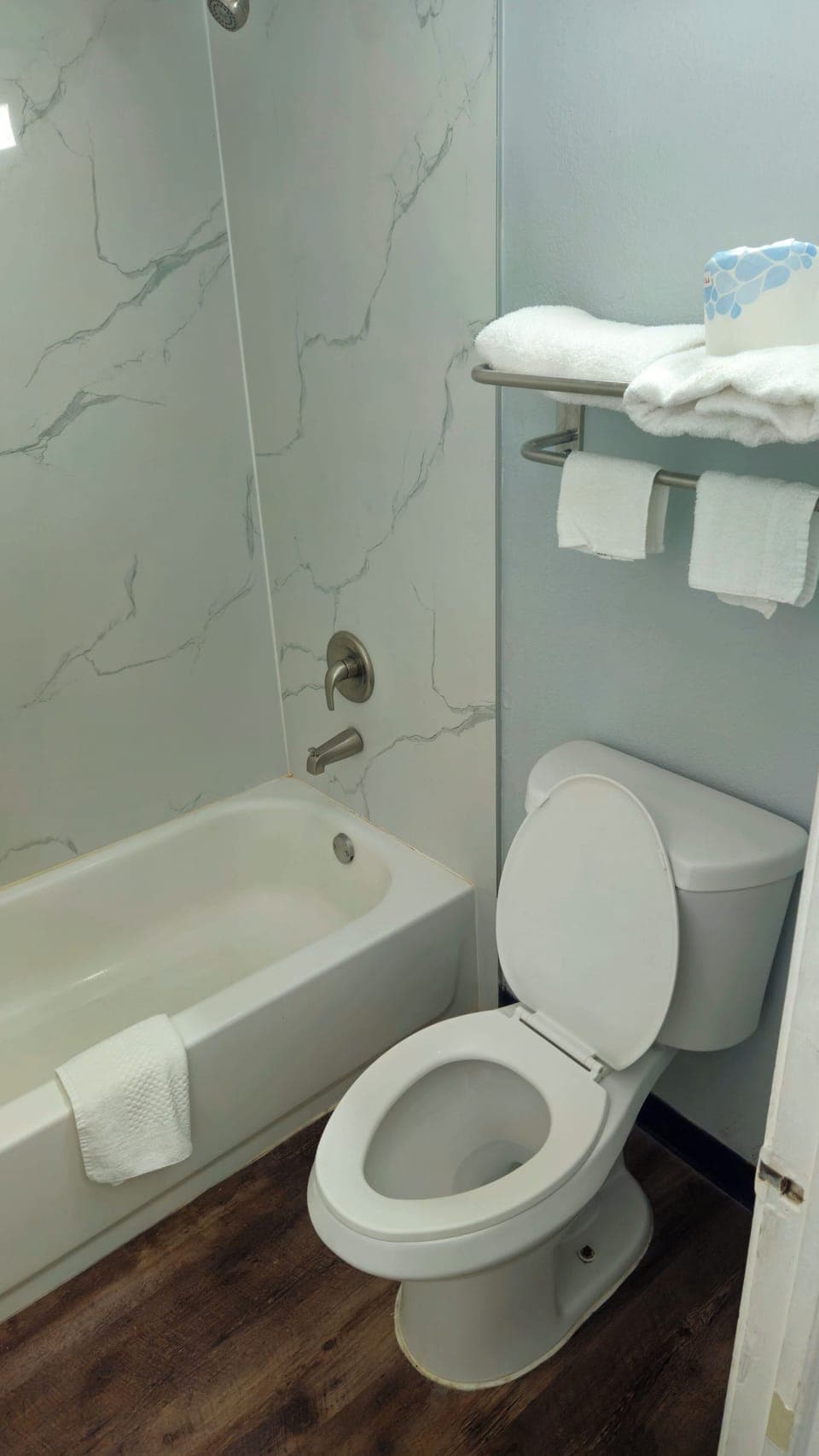 Combined shower/tub, hair dryer, towels, soap