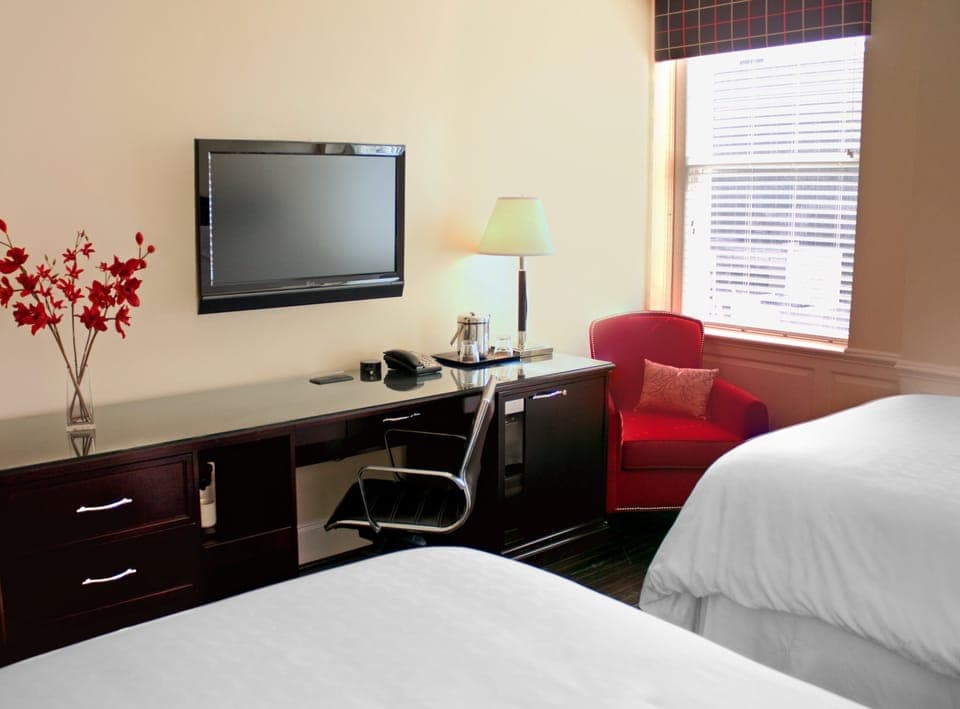 Hypo-allergenic bedding, down comforters, pillowtop beds, in-room safe