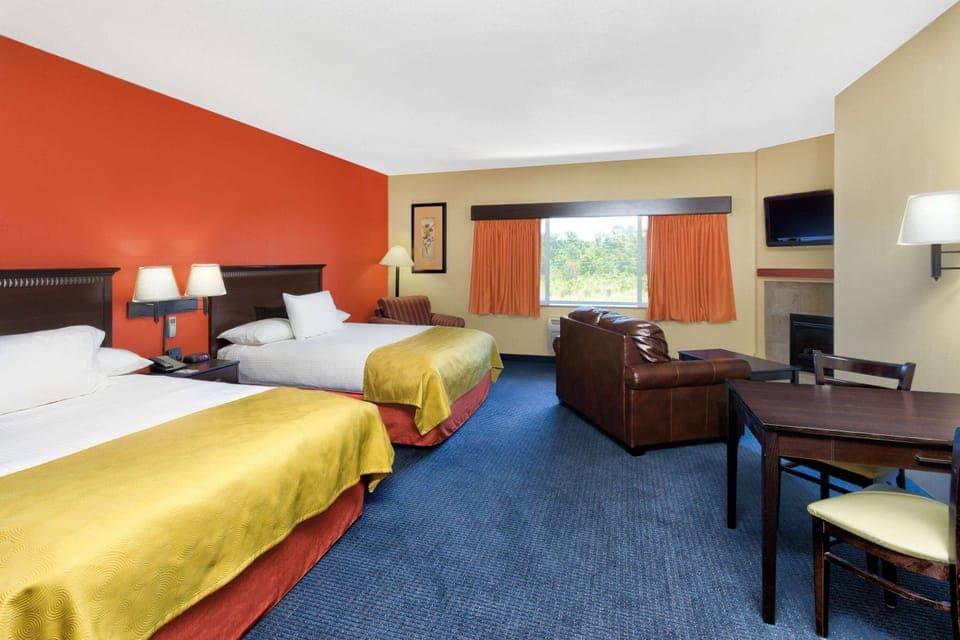 Blackout drapes, soundproofing, iron/ironing board, rollaway beds