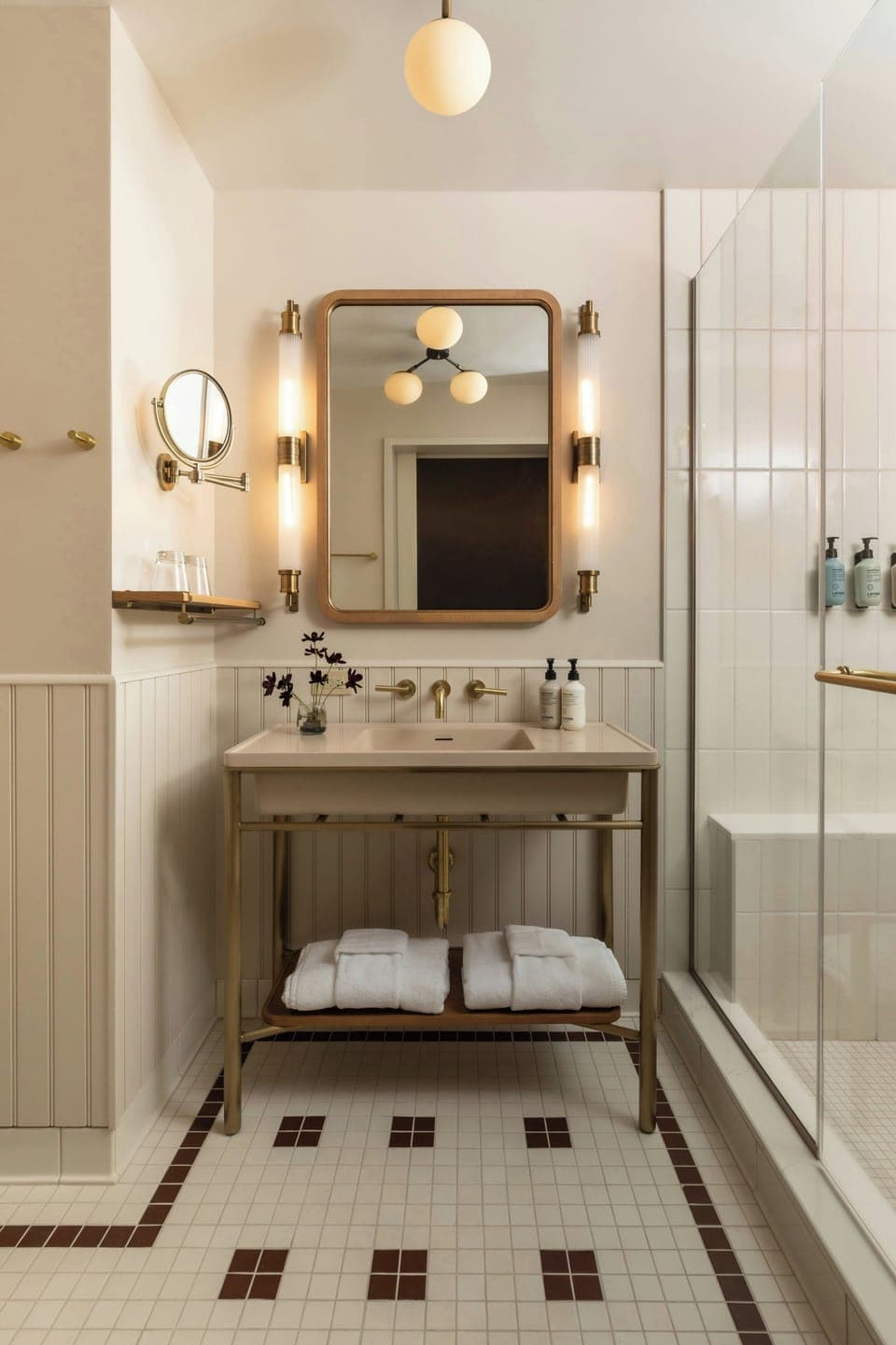 Shower, rainfall showerhead, designer toiletries, hair dryer